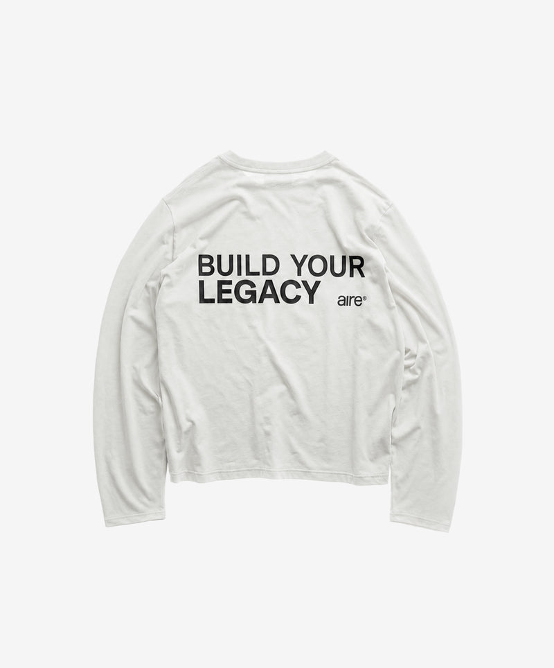 BUILD YOUR LEGACY TRAINING LONGSLEEVE CREAM